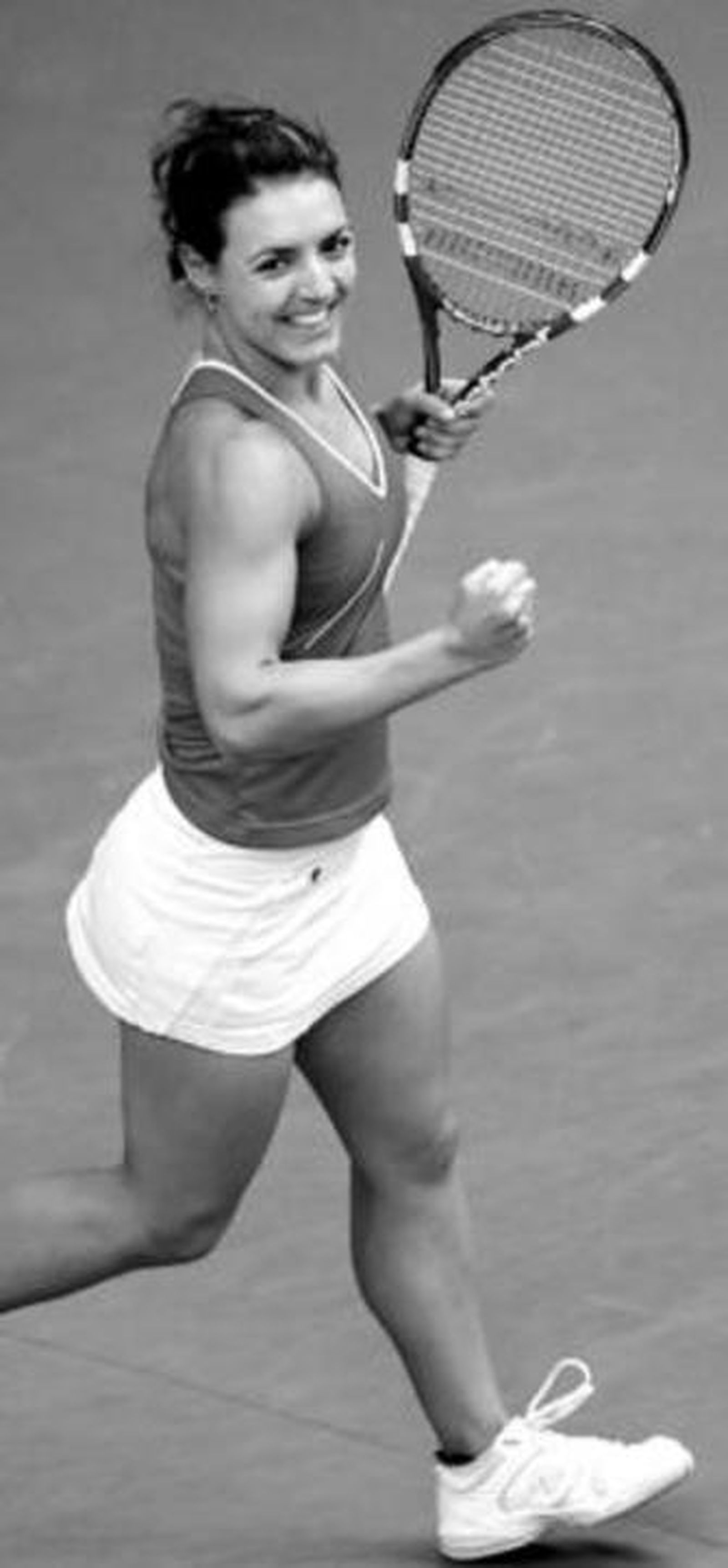 Nuria Llagostera celebra su triunfo sobre la checa Benesova.