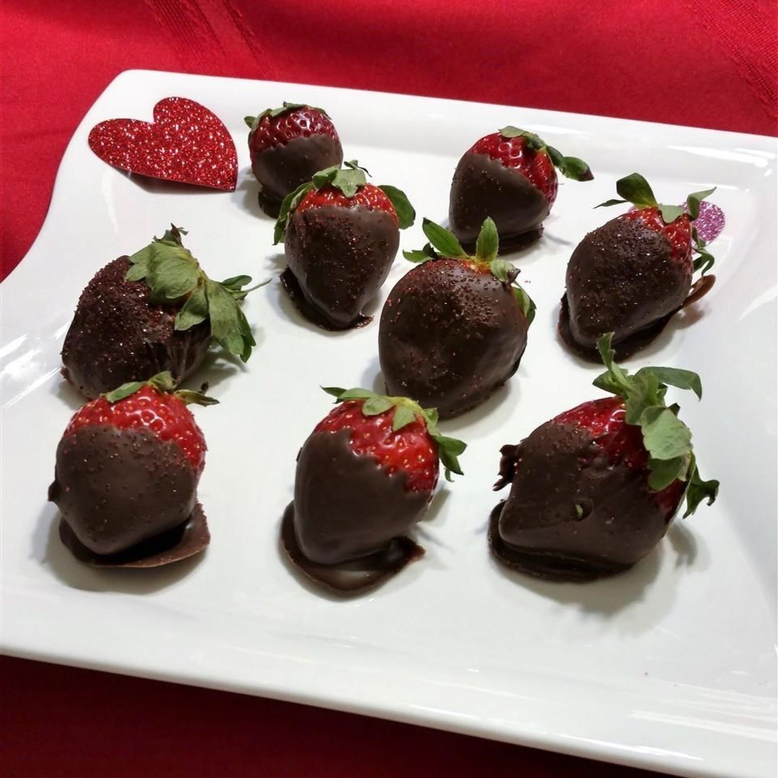 Fresas bañadas en chocolate como postre.