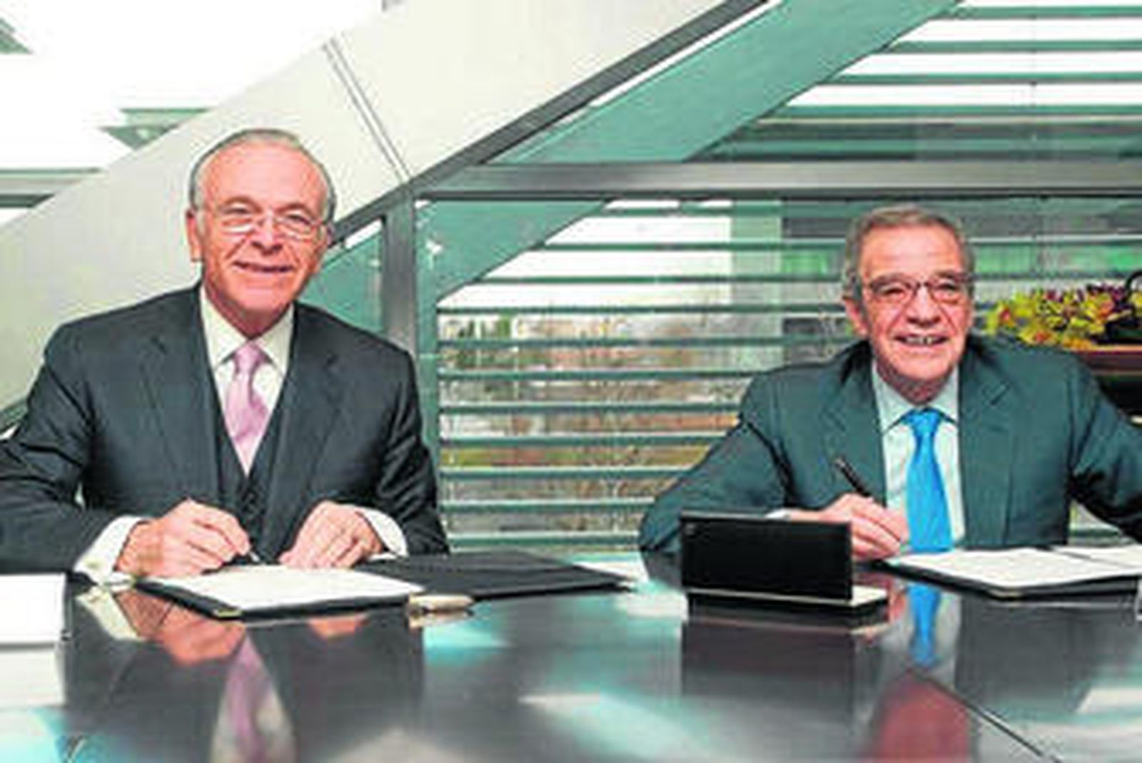 Isidro Fainé, presidente de Caixabank, y César Alierta, presidente de Telefónica.