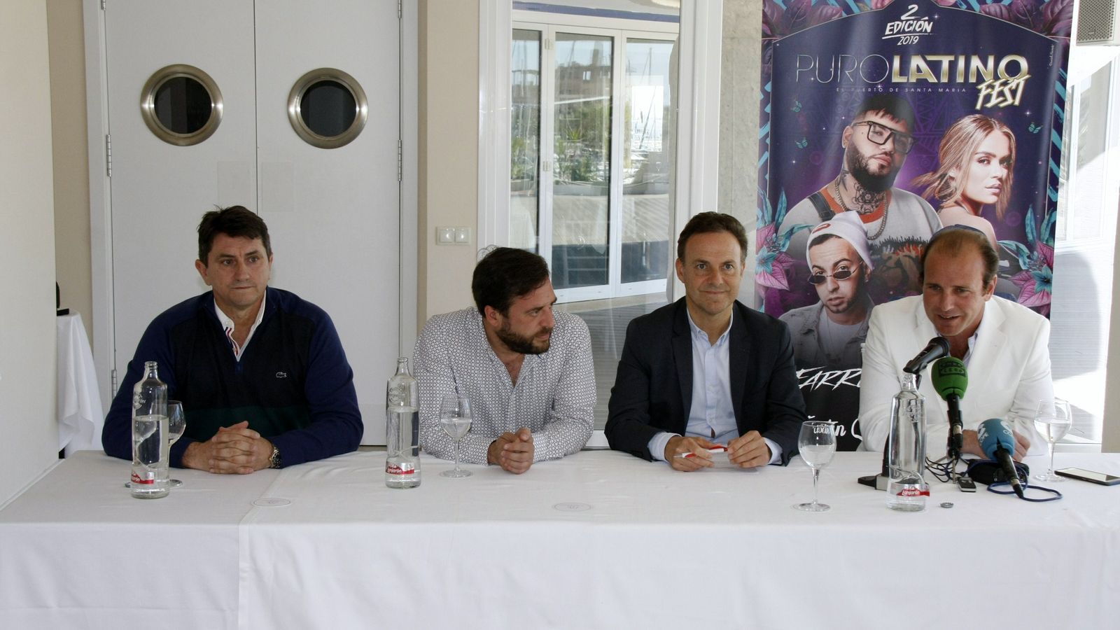 De Izda. a Dcha.: Pascual Llopis (director del Puro Latino Fest), Tali Carreto (director de comunicación del evento), el alcalde David de la Encina y Enrique López Bosch (director de Puerto Sherry) esta mañana durante la presentación.