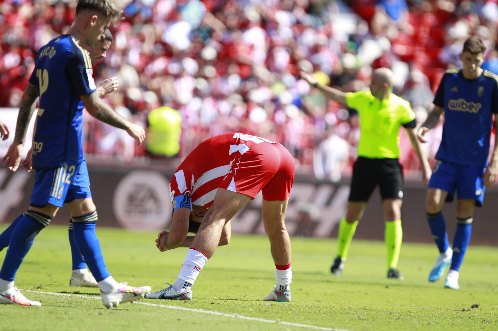 Imágenes del empate a 3 de la U.D. Almería y el Granada C.F.