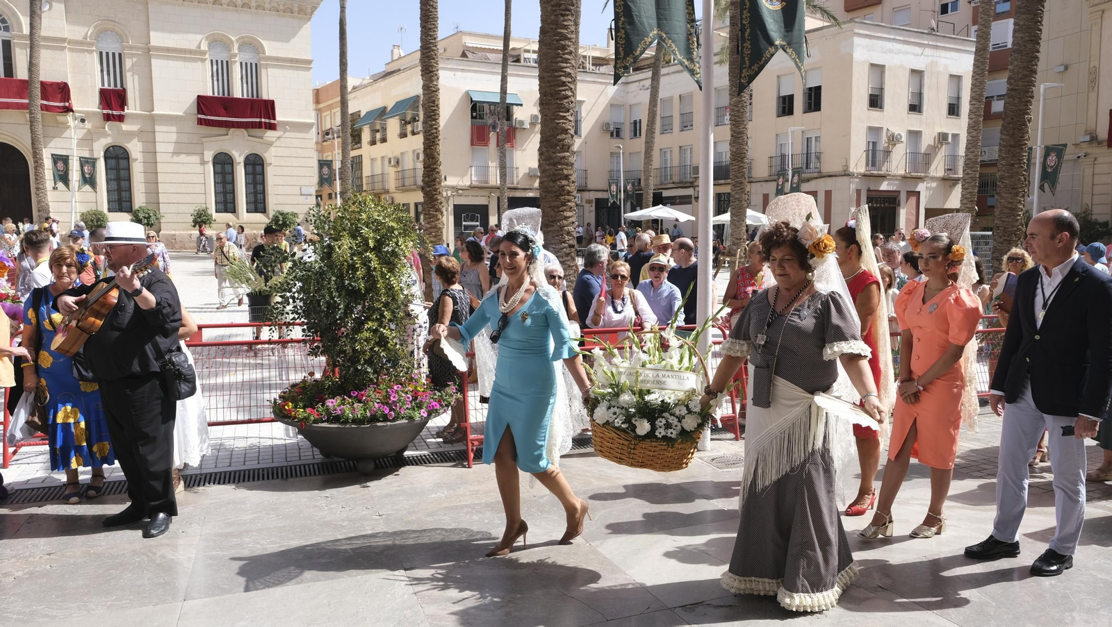Ofrenda floral a la Virgen del Mar en la Feria de Almería 2024, en imágenes