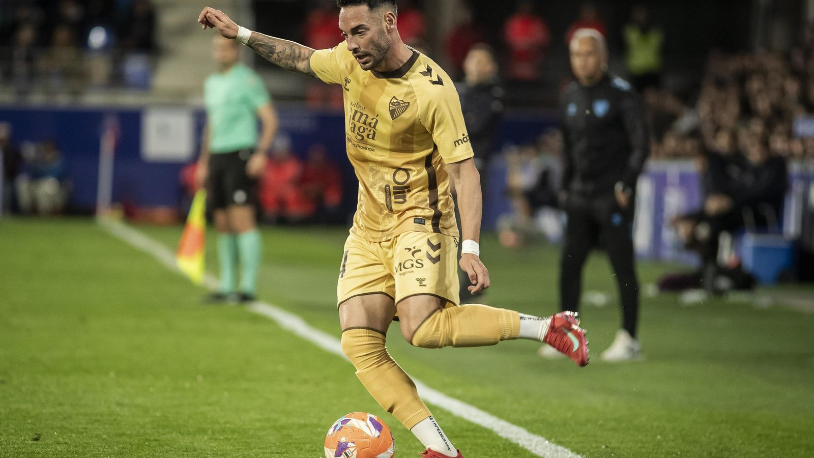 El Huesca-Málaga CF, en fotos