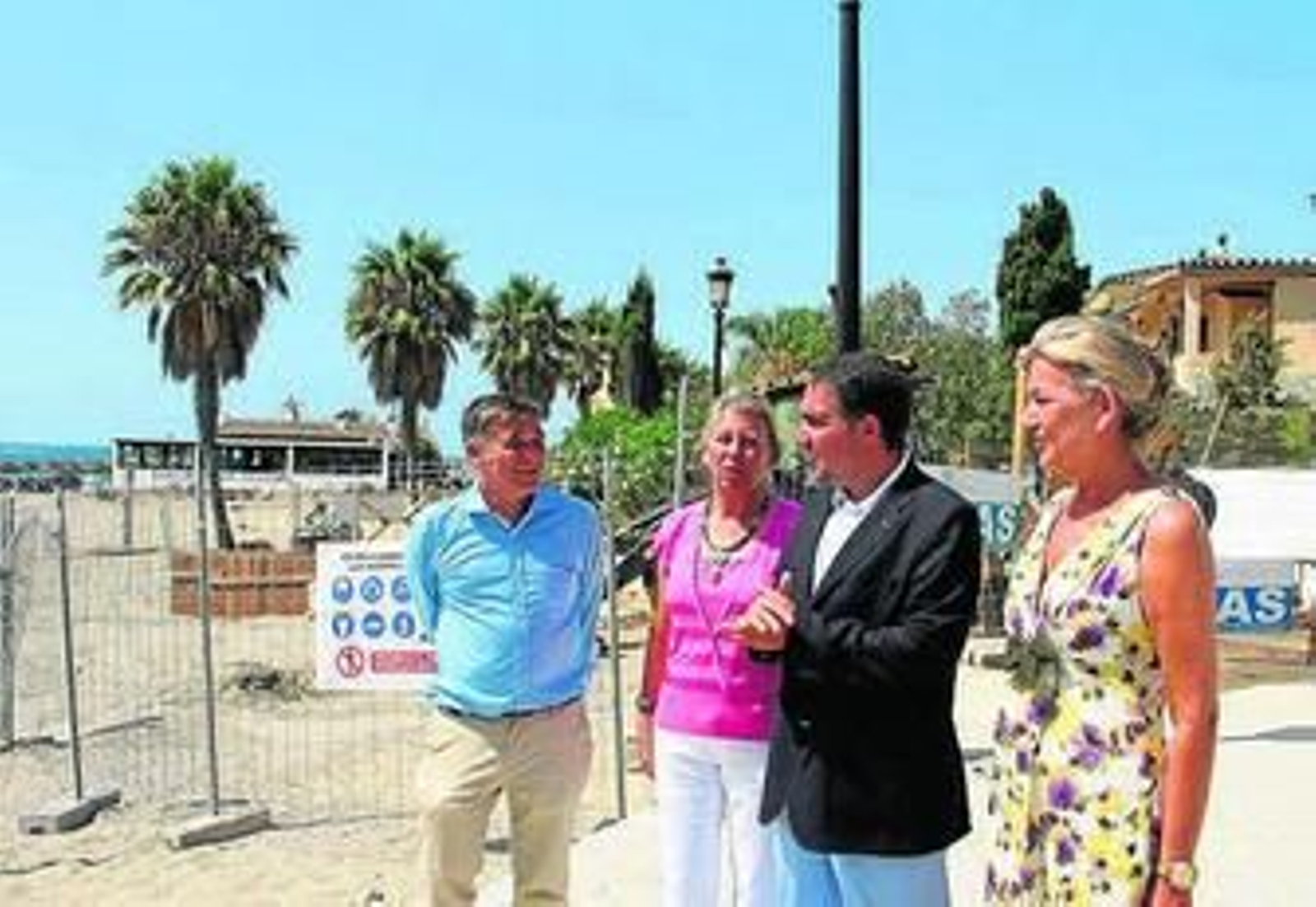 En el centro, Bendodo y Muñoz.