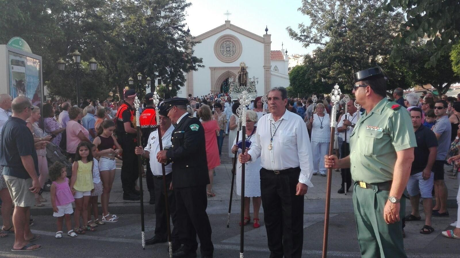 La Virgen del Carmen de El Palo, a su salida de la parroquia de las Angustias en 2017.