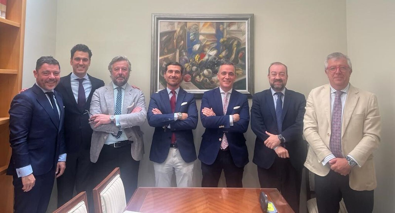 Los nuevos socios posan con algunos de los responsables de Nertis.