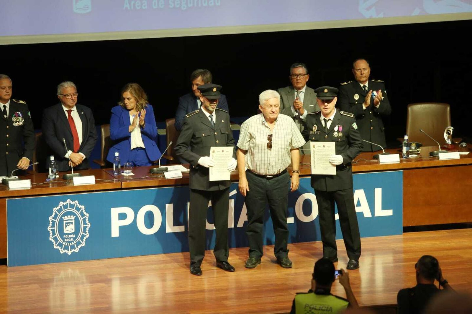 Las imágenes del acto de distinción de agentes de la Policía Local de Málaga en el día de su patrón