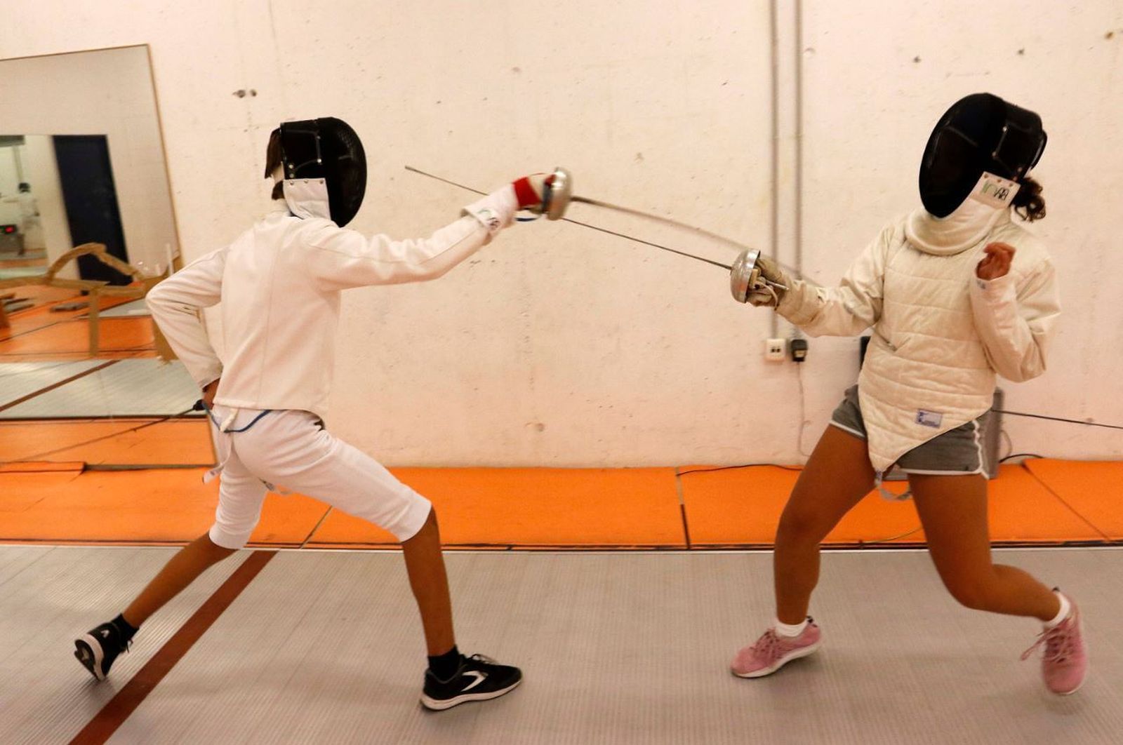 Dos participantes, en acción durante el torneo.