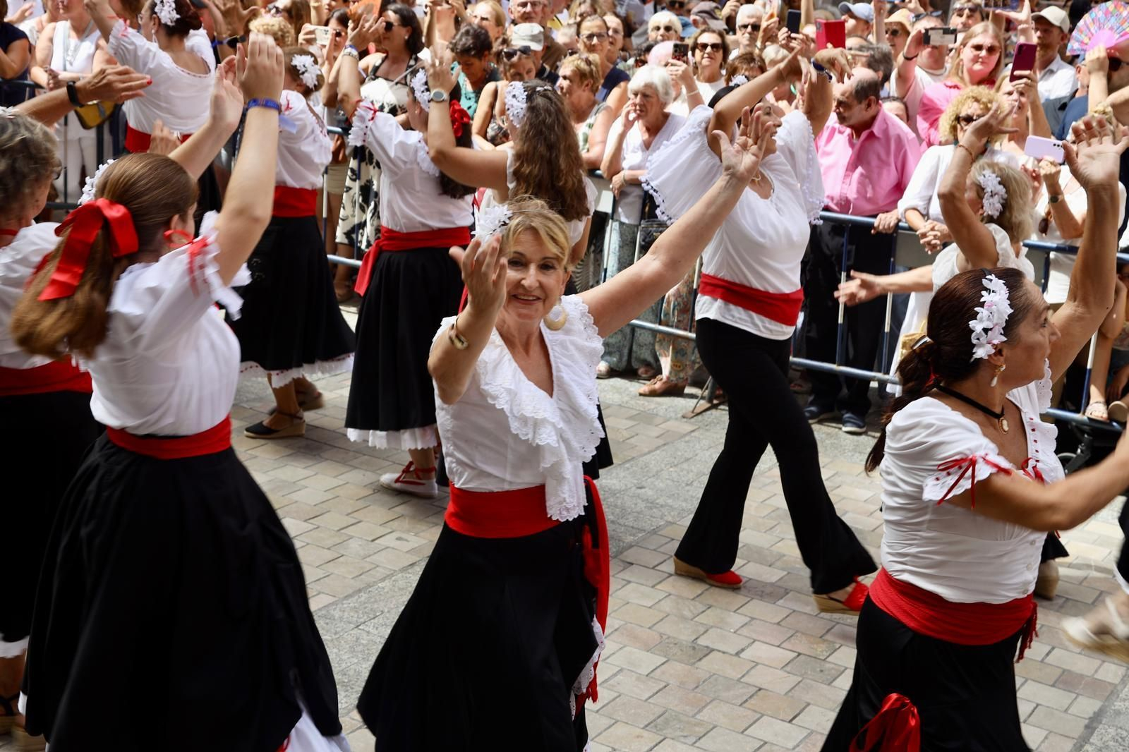 La misa estacional y el pasacalles previo a la procesión de la Victoria en Málaga, en imágenes