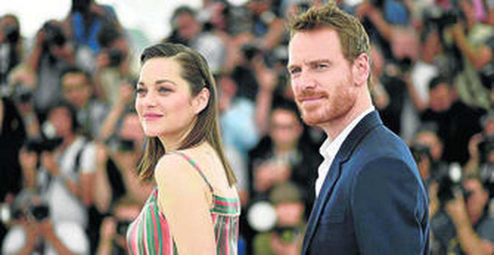 Marion Cotillard y Michael Fassbender, en el photocall de 'Macbeth'.