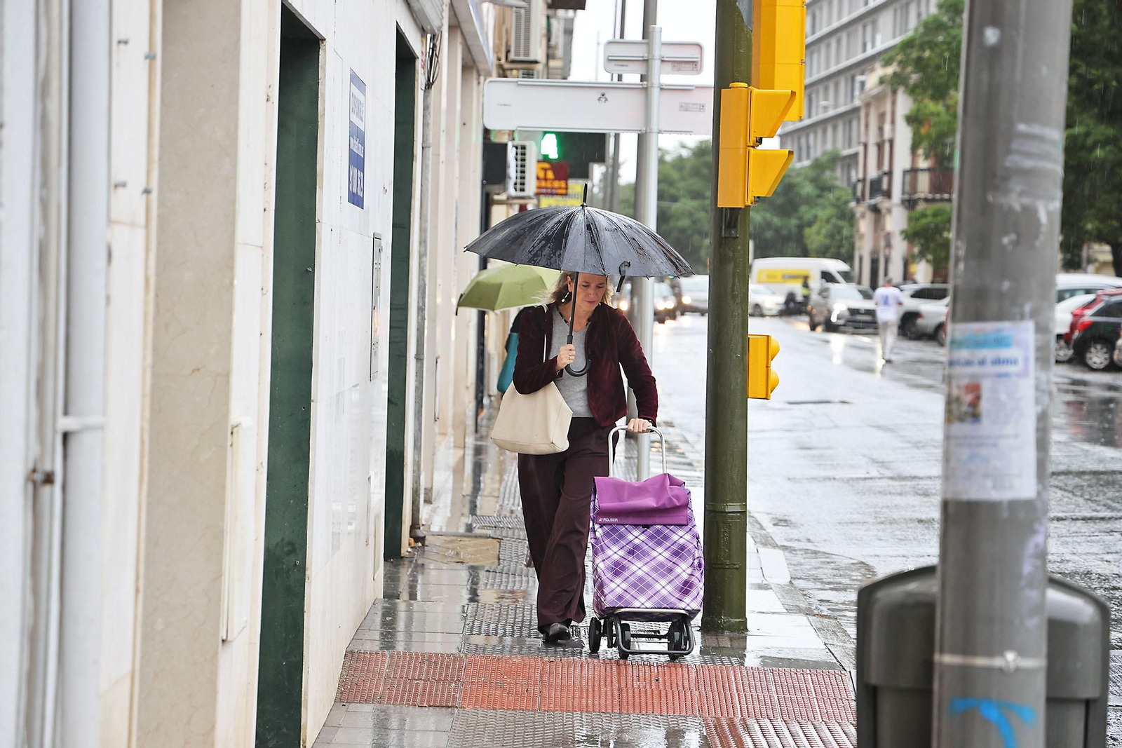 Imágenes de la lluviosa mañana de sábado en Huelva