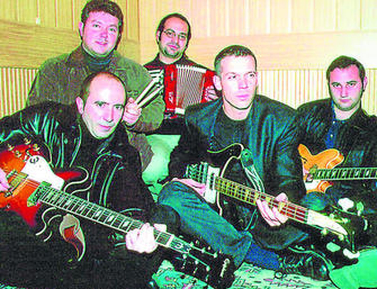 Los Escarabajos, un grupo que es una réplica exacta de The Beatles.