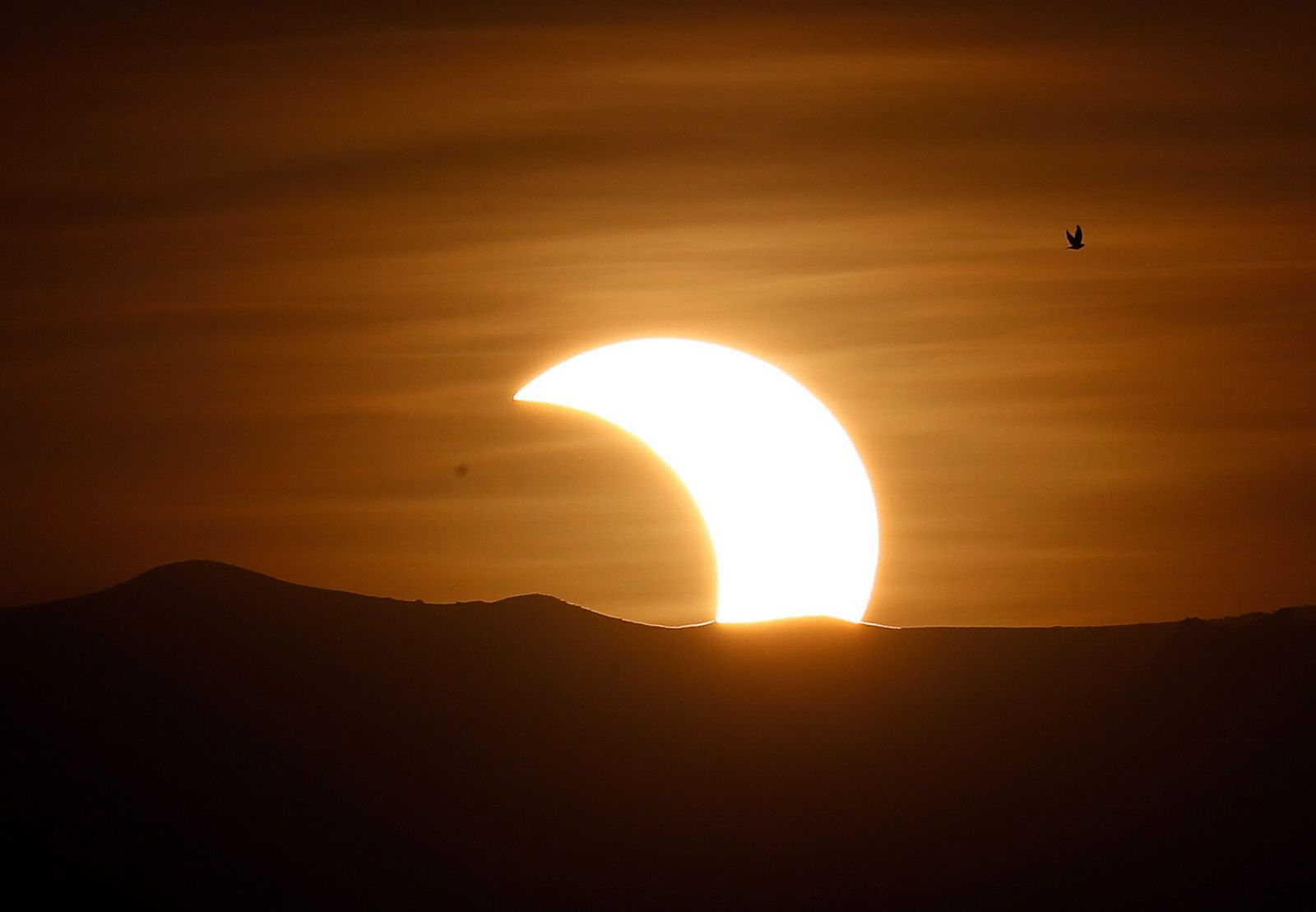 Las imágenes del último eclipse solar de la década