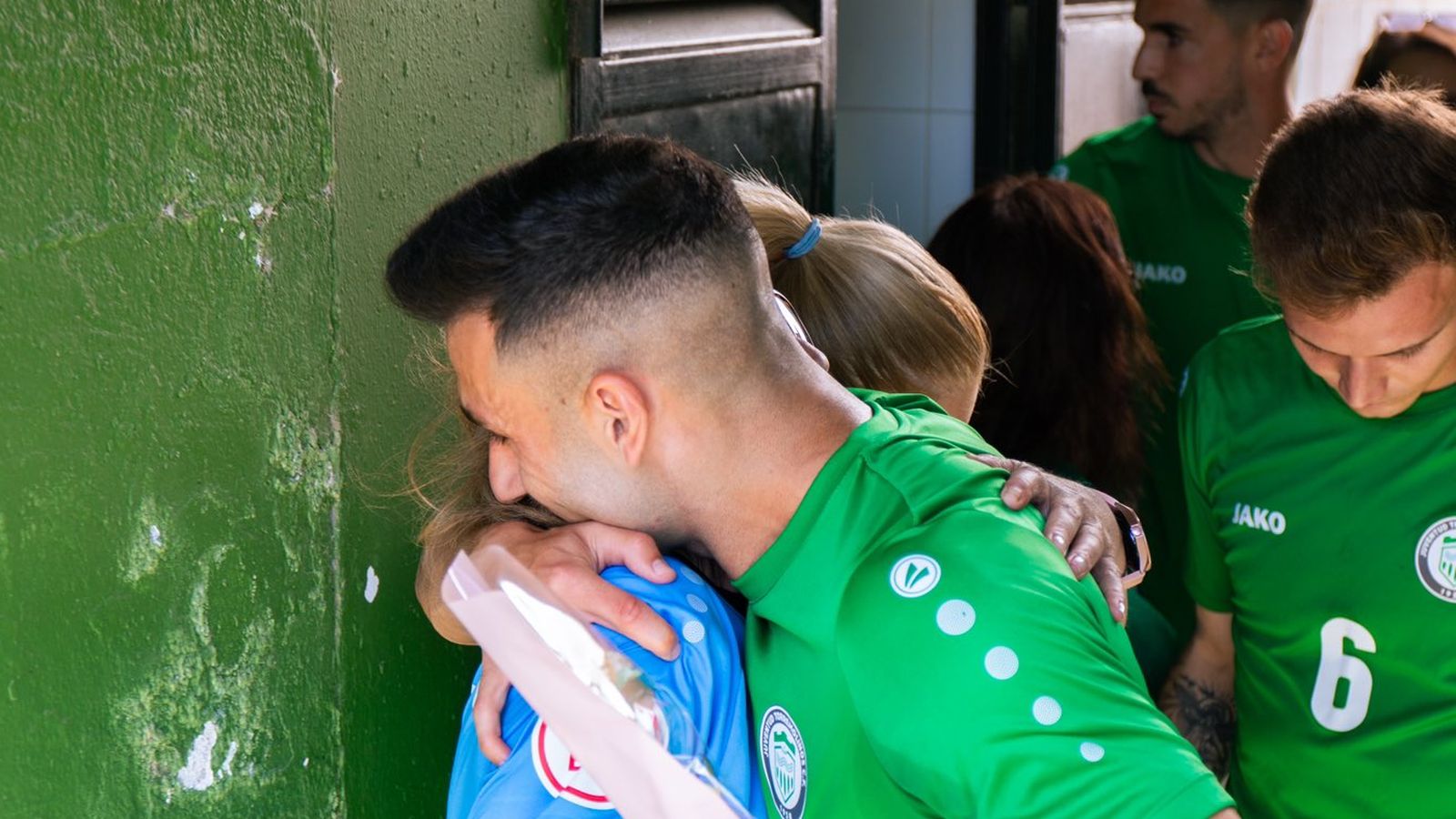 Los jugadores, con sus madres.