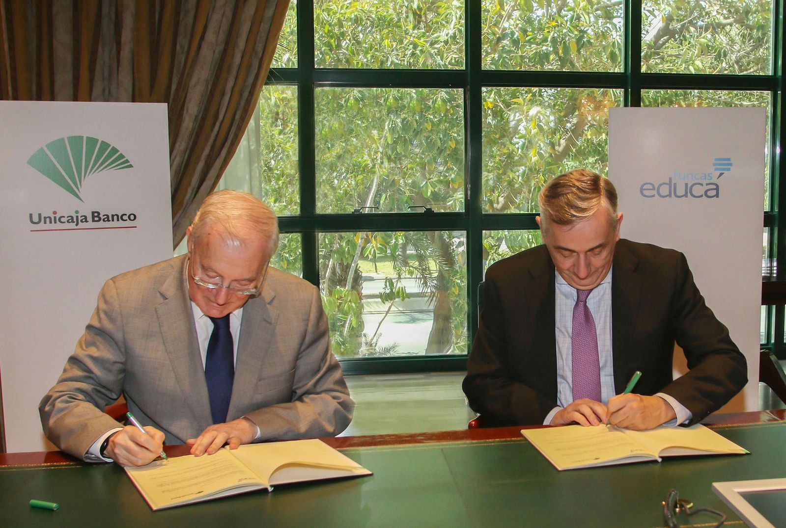 El presidente de Unicaja  Banco y el director general de Funcas.