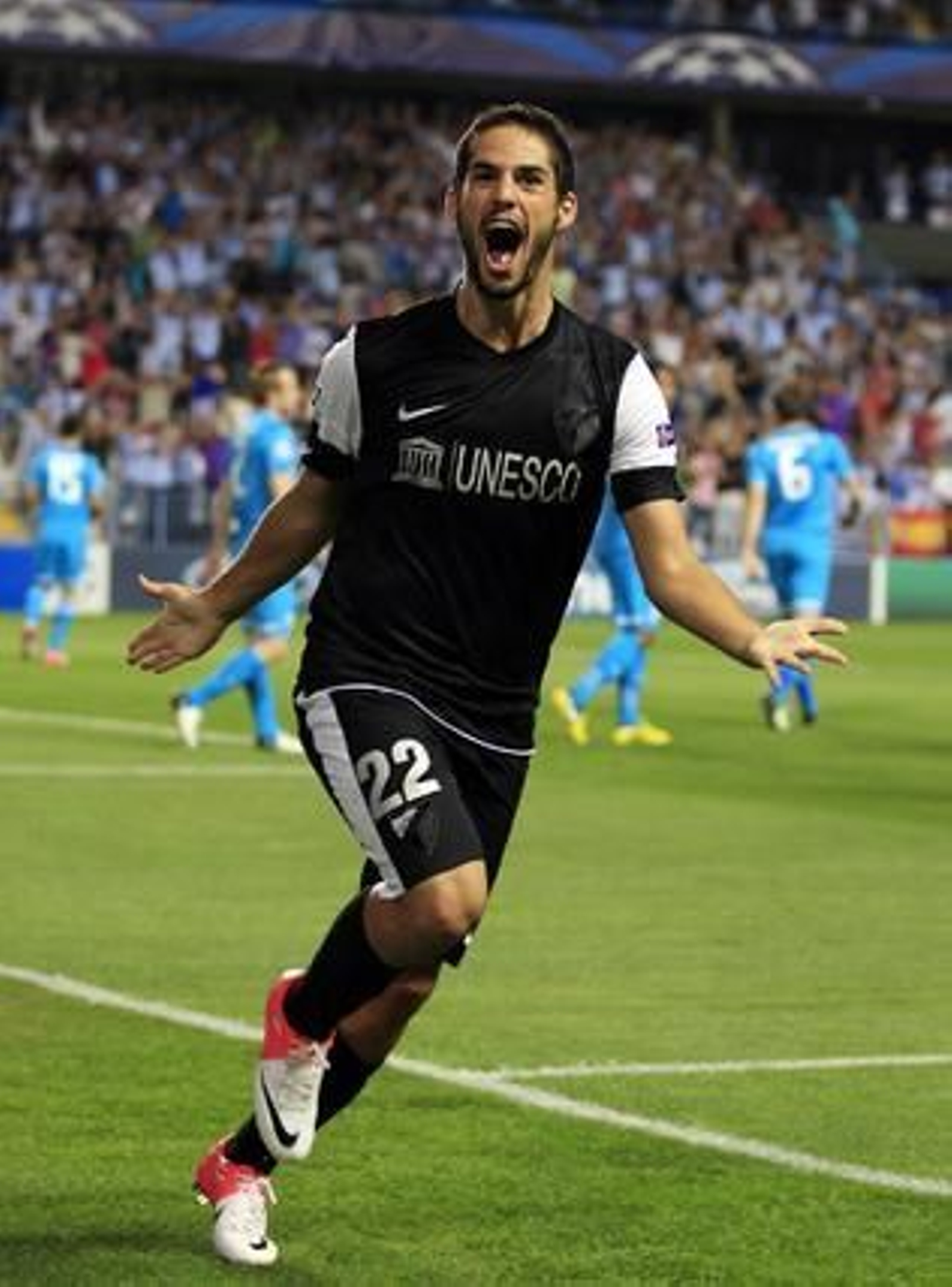 El estreno soñado del Málaga en la Champions, en fotos 

Foto: EFE