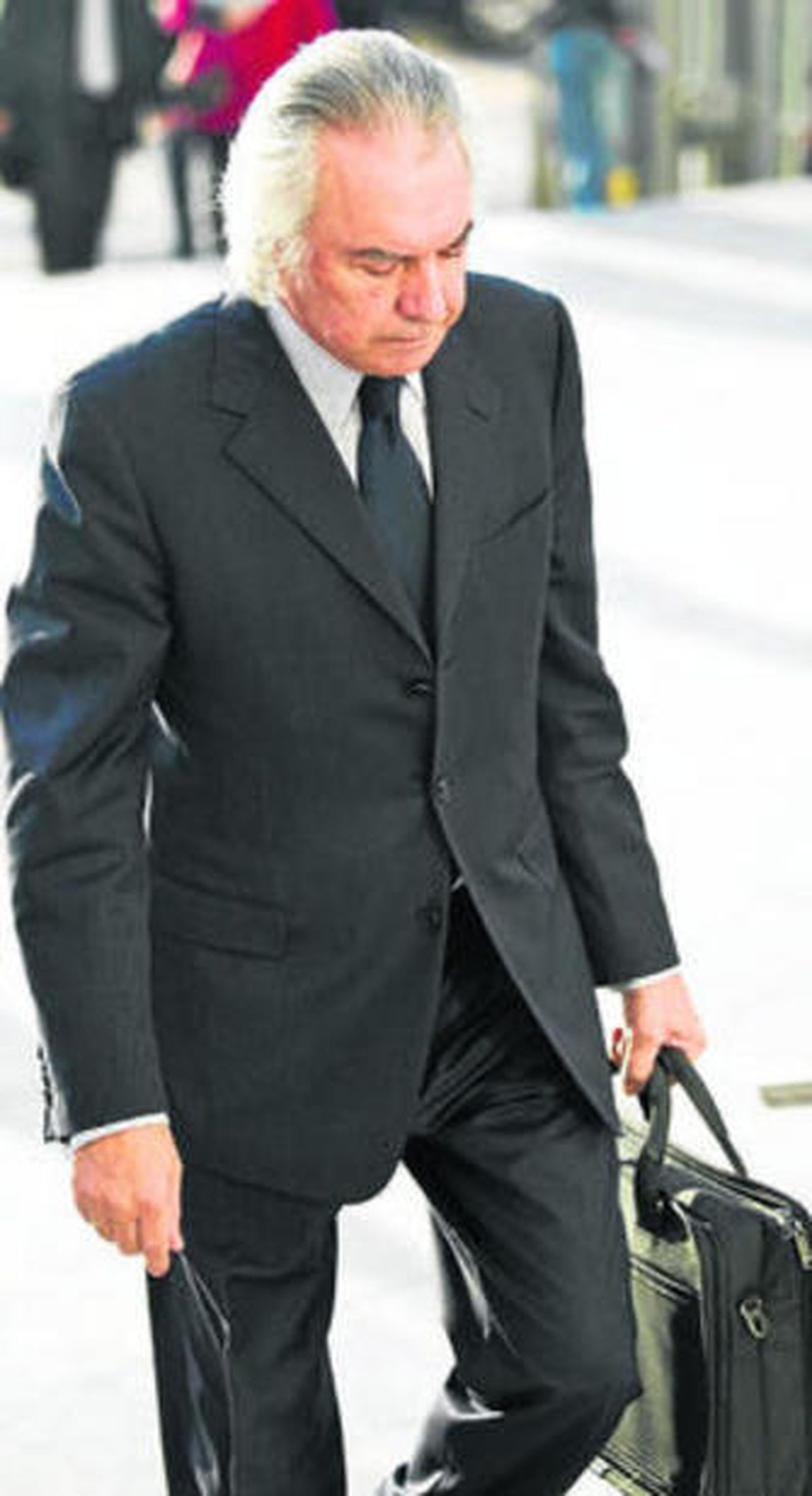 Pedro Román, a su llegada ayer a la Audiencia de Málaga.