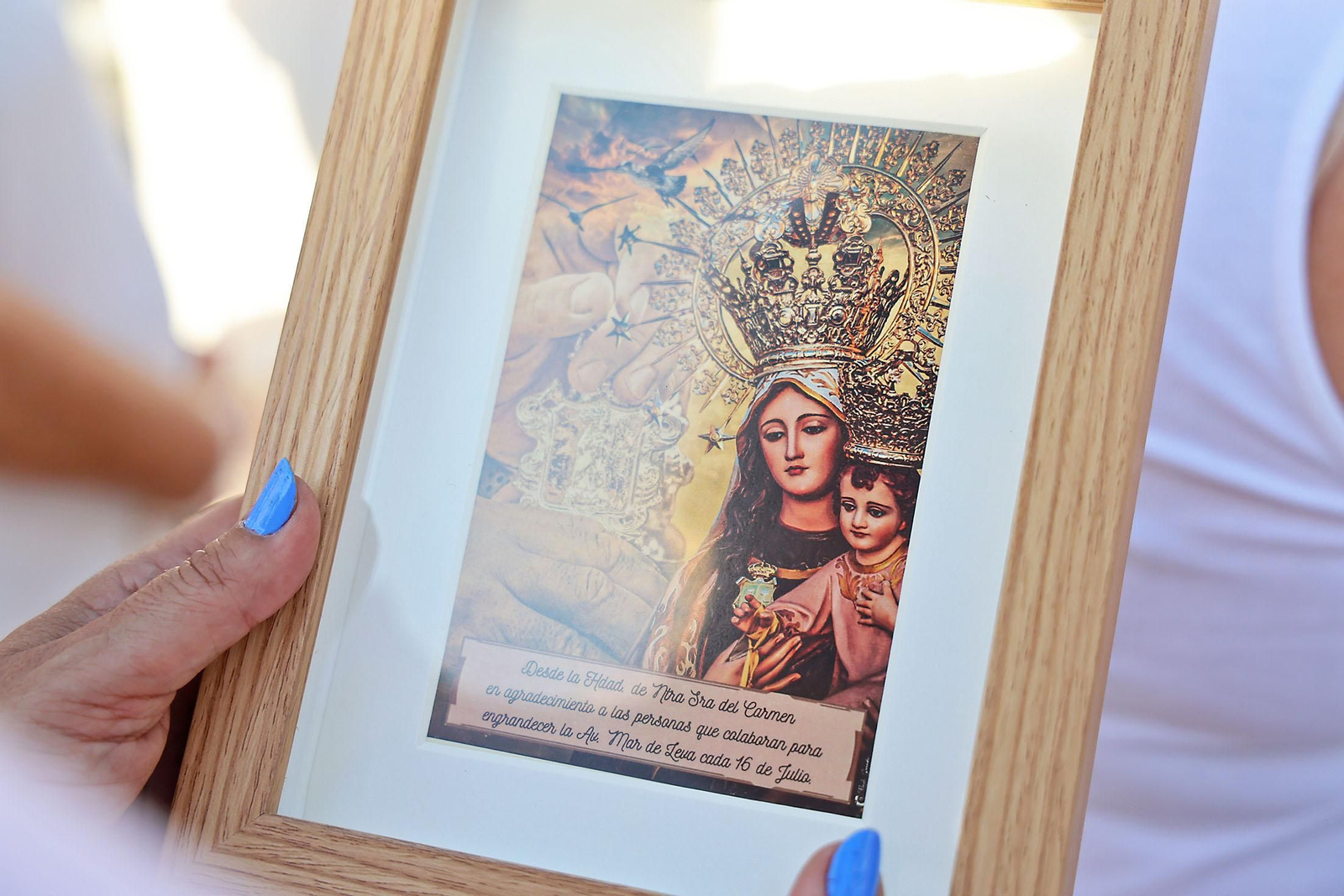 Imágenes de la Virgen del Carmen procesionando en Punta Umbría