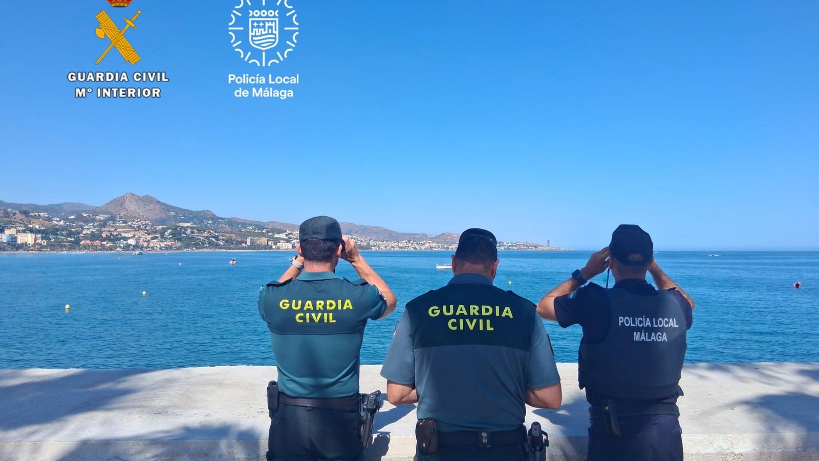 Dos agentes de la Guardia Civil y un policía local. Dos agentes de la Guardia Civil y un policía local.