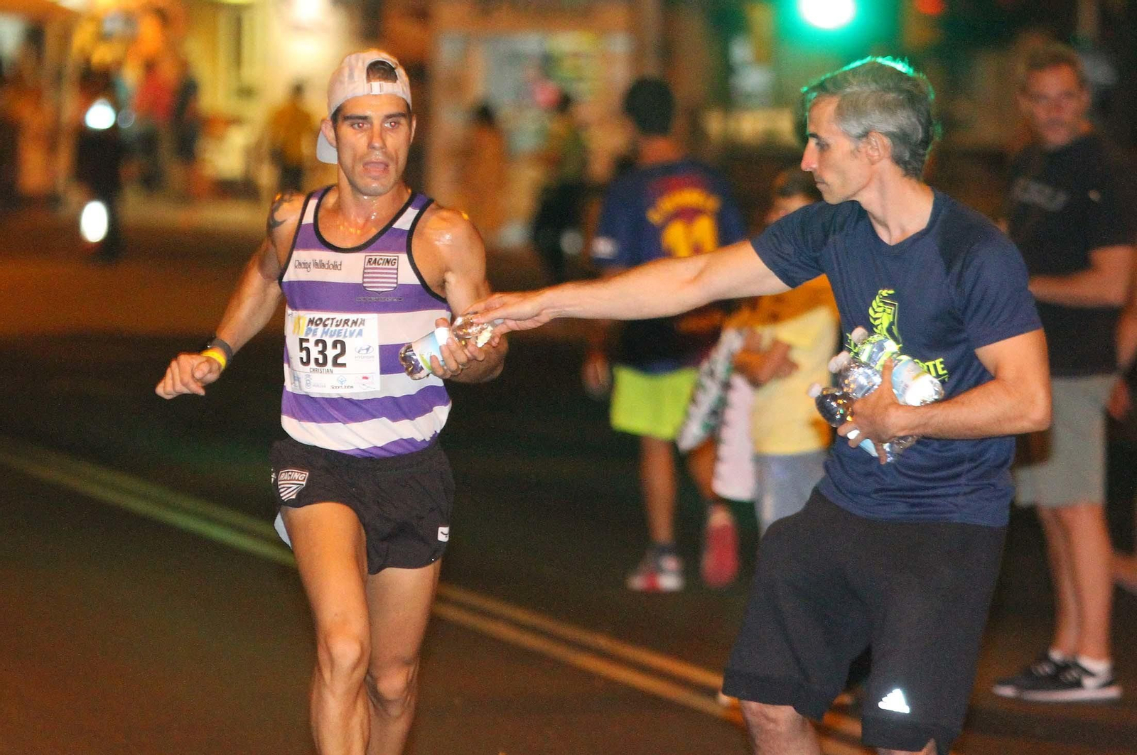 La VII Carrera Nocturna de Huelva en imágenes
