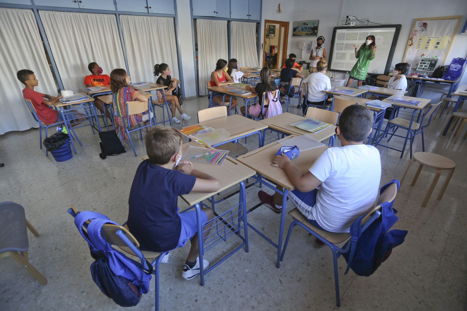 Vuelta al cole en Málaga: Fotos de un día de nervios y mascarillas