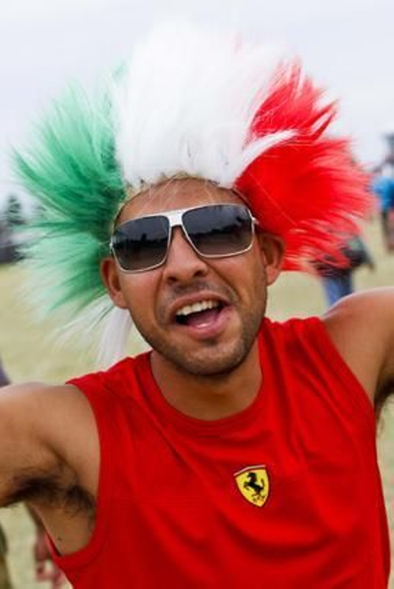 Un 'tifosi' en el circuito de Melbourne. (FOTOS: AFP/Reuters/EFE)