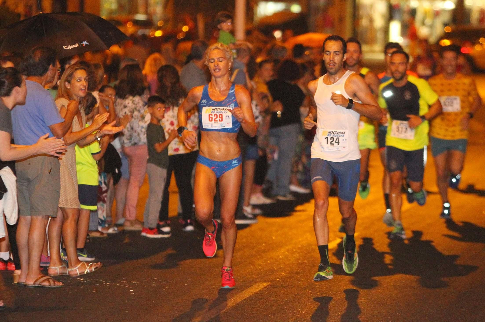 La VII Carrera Nocturna de Huelva en imágenes