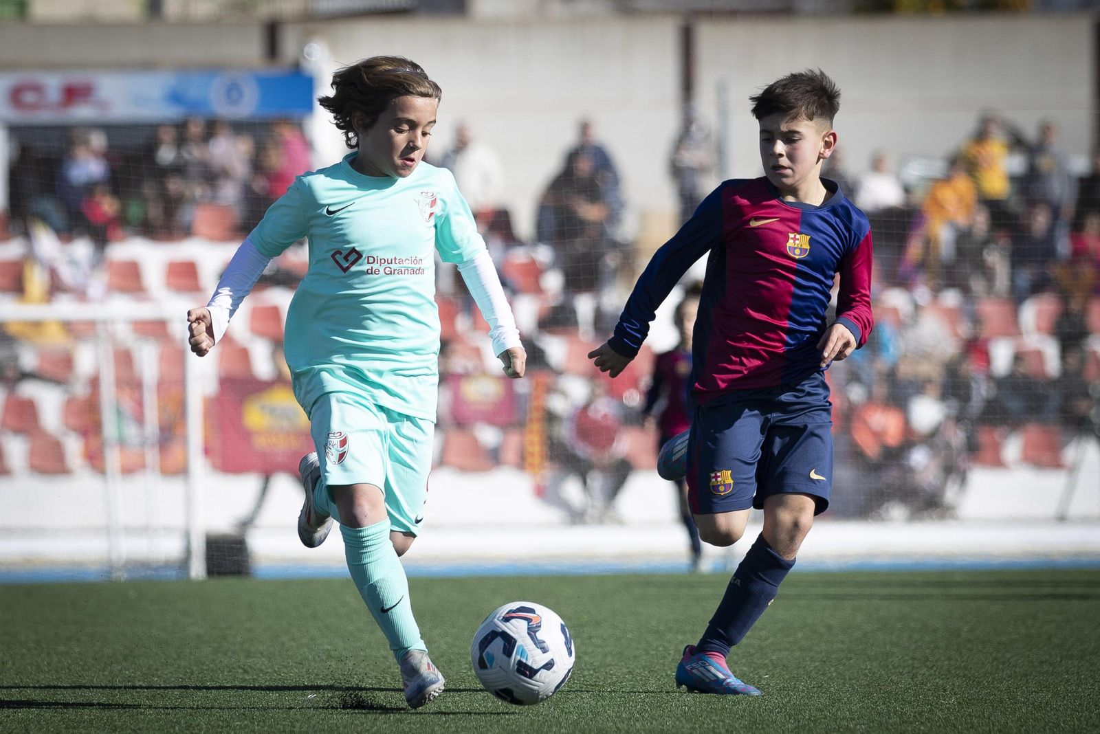 Acción de uno de los partidos jugados en Pinos Puente