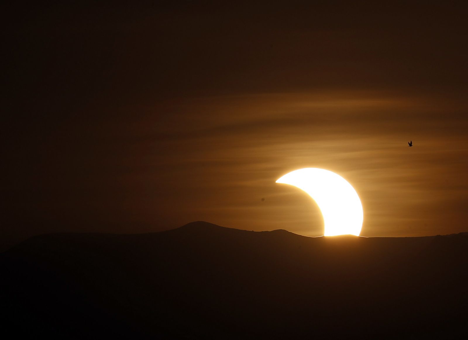 Las imágenes del último eclipse solar de la década
