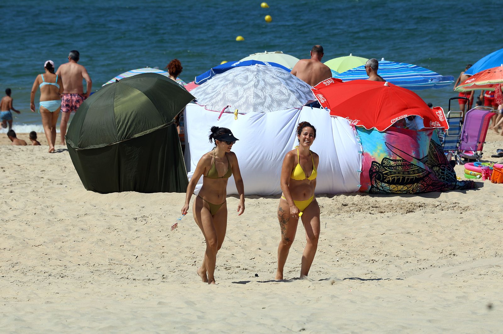 Imágenes de una mañana de calor y playa en Matalascañas