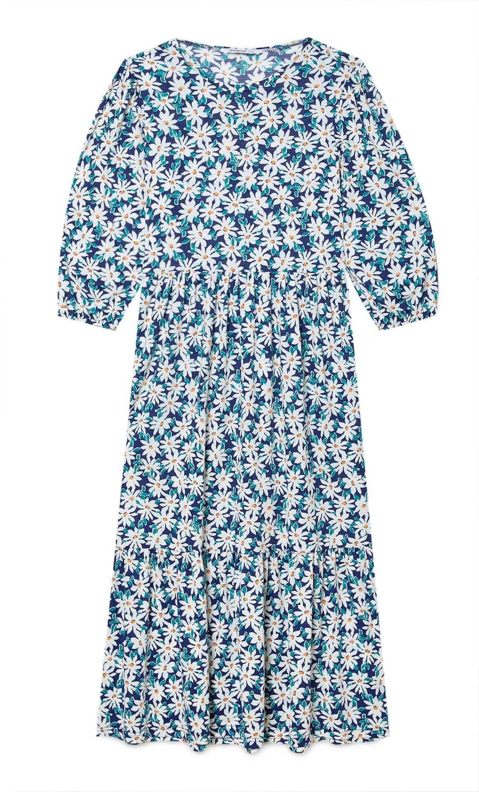 Vestido con margaritas de Stradivarius.