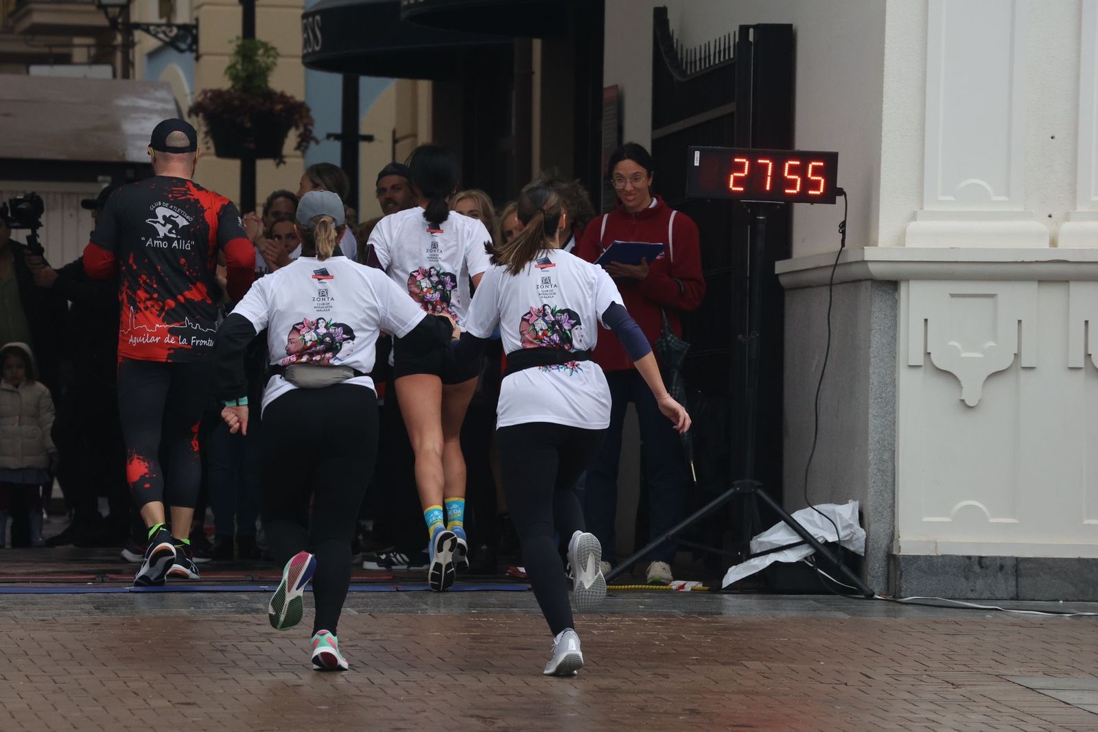La Carrera por el Día Internacional de la Mujer en Málaga, en fotos