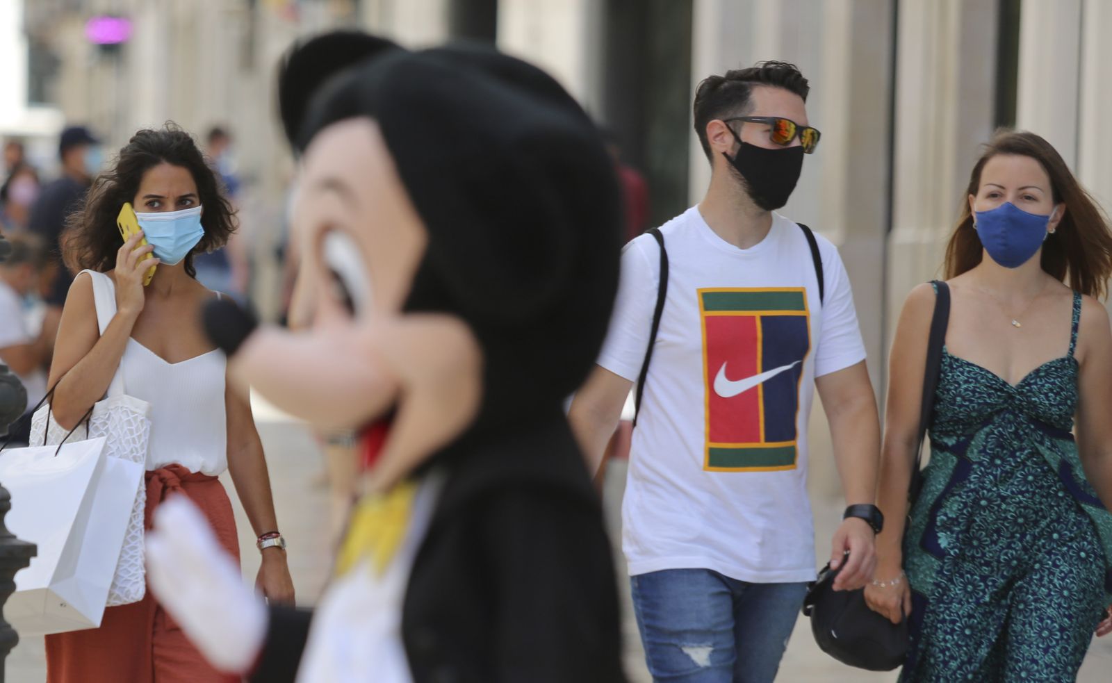 Fotos del primer día de mascarillas obligatorias en las playas y el Centro de Málaga