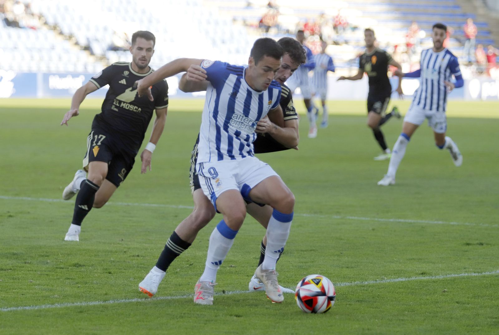 Imágenes del encuentro entre el Recreativo de Huelva y el Real Murcia