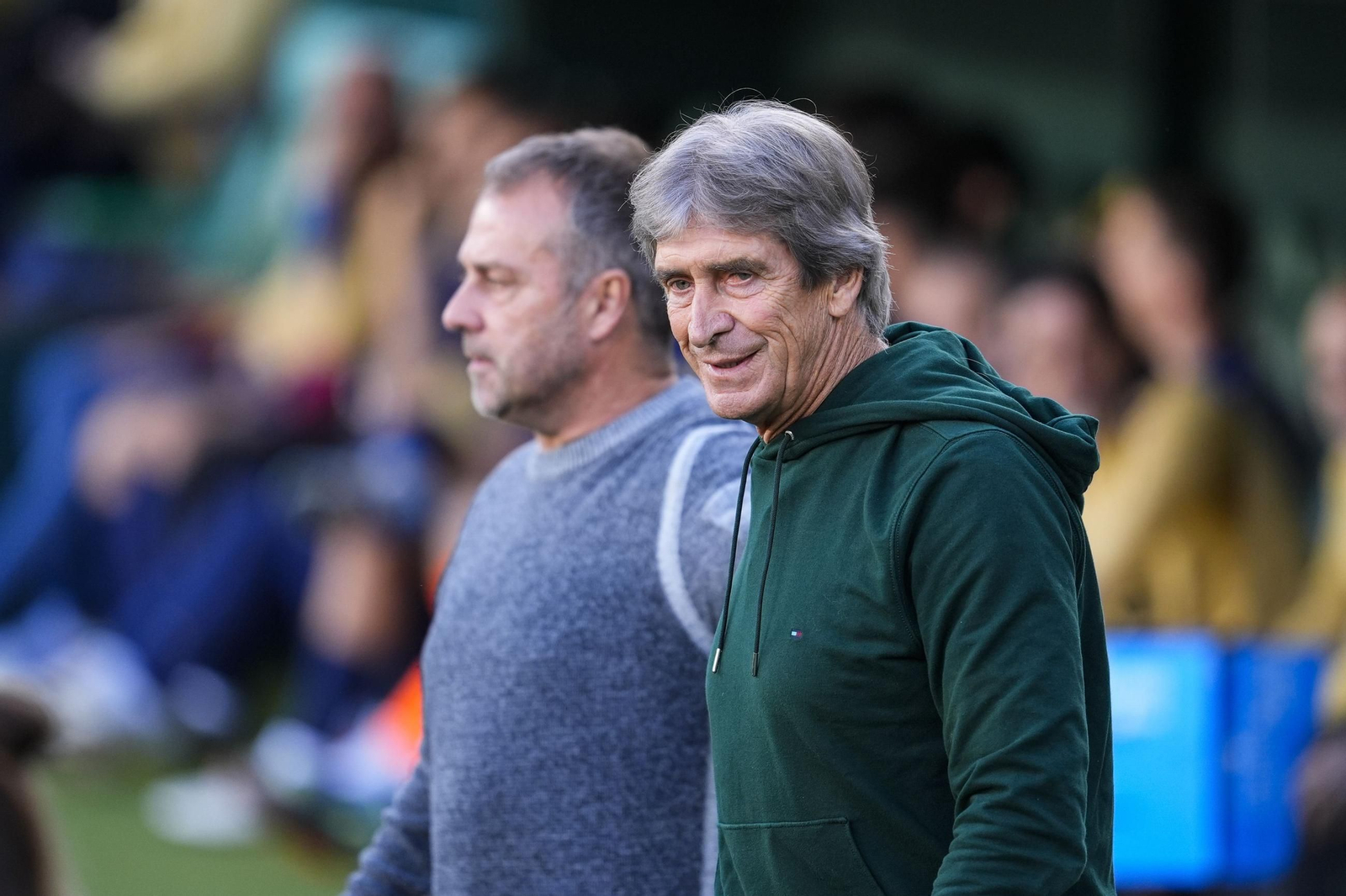Pellegrini y Flick se saludan antes del último Betis-Barcelona.