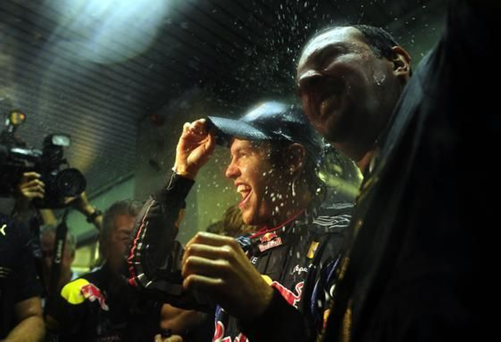 Sebastian Vettel celebra en Abu Dhabi su título mundial.

Foto: AFP Photo