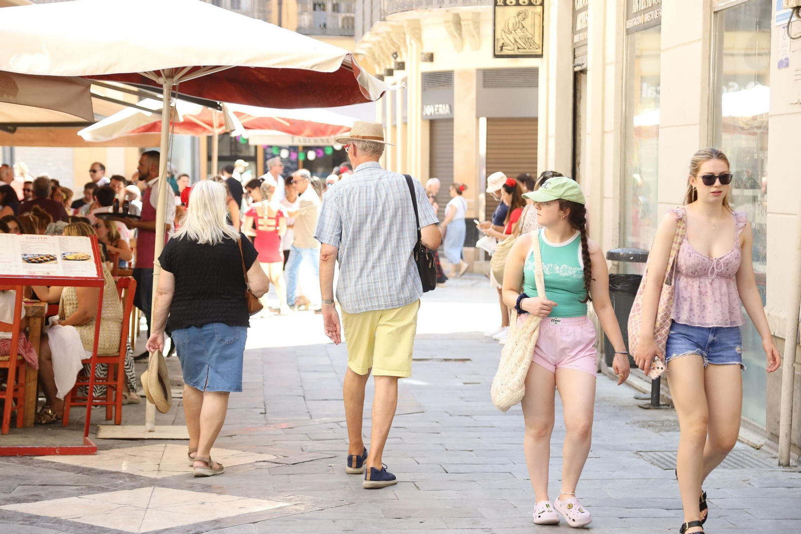 El miércoles de Feria en el Centro de Málaga, en imágenes