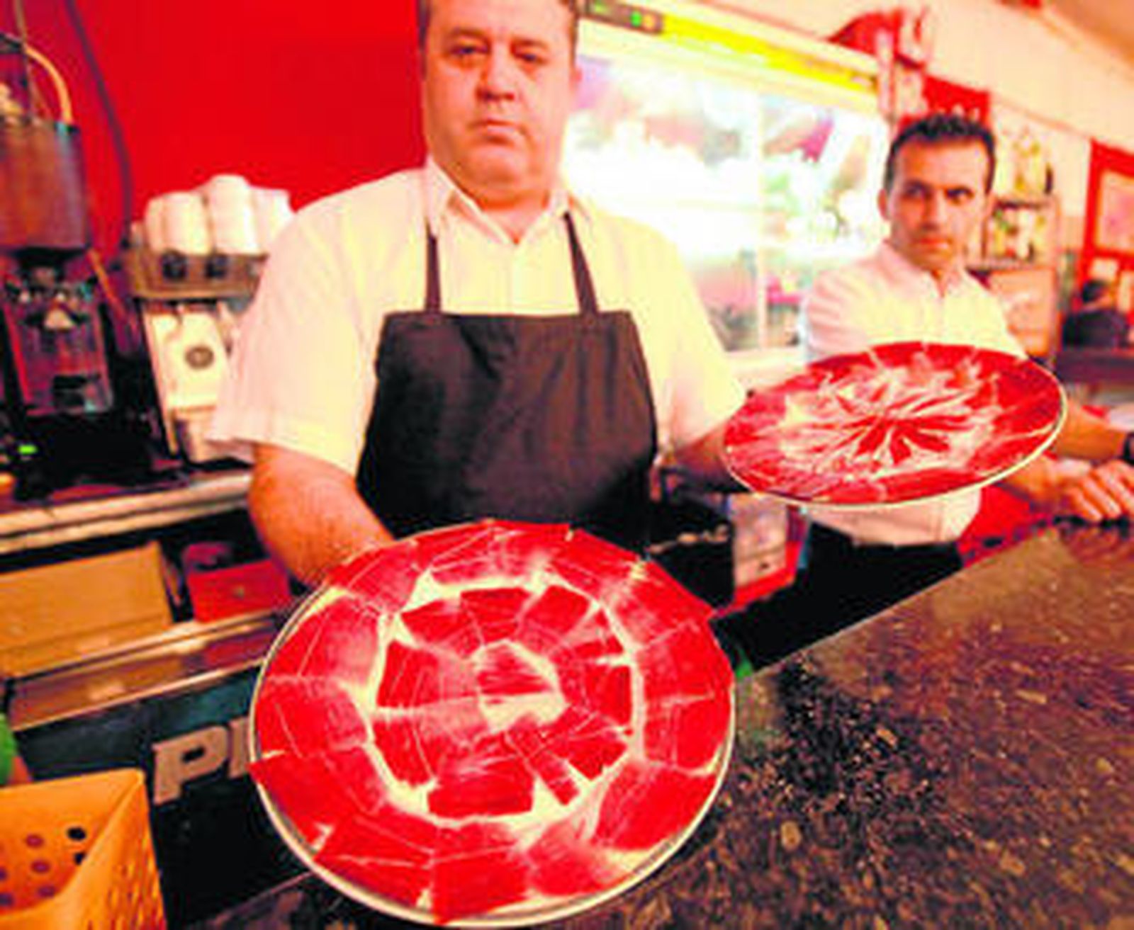 Imagen de un puesto de pulpo asado.