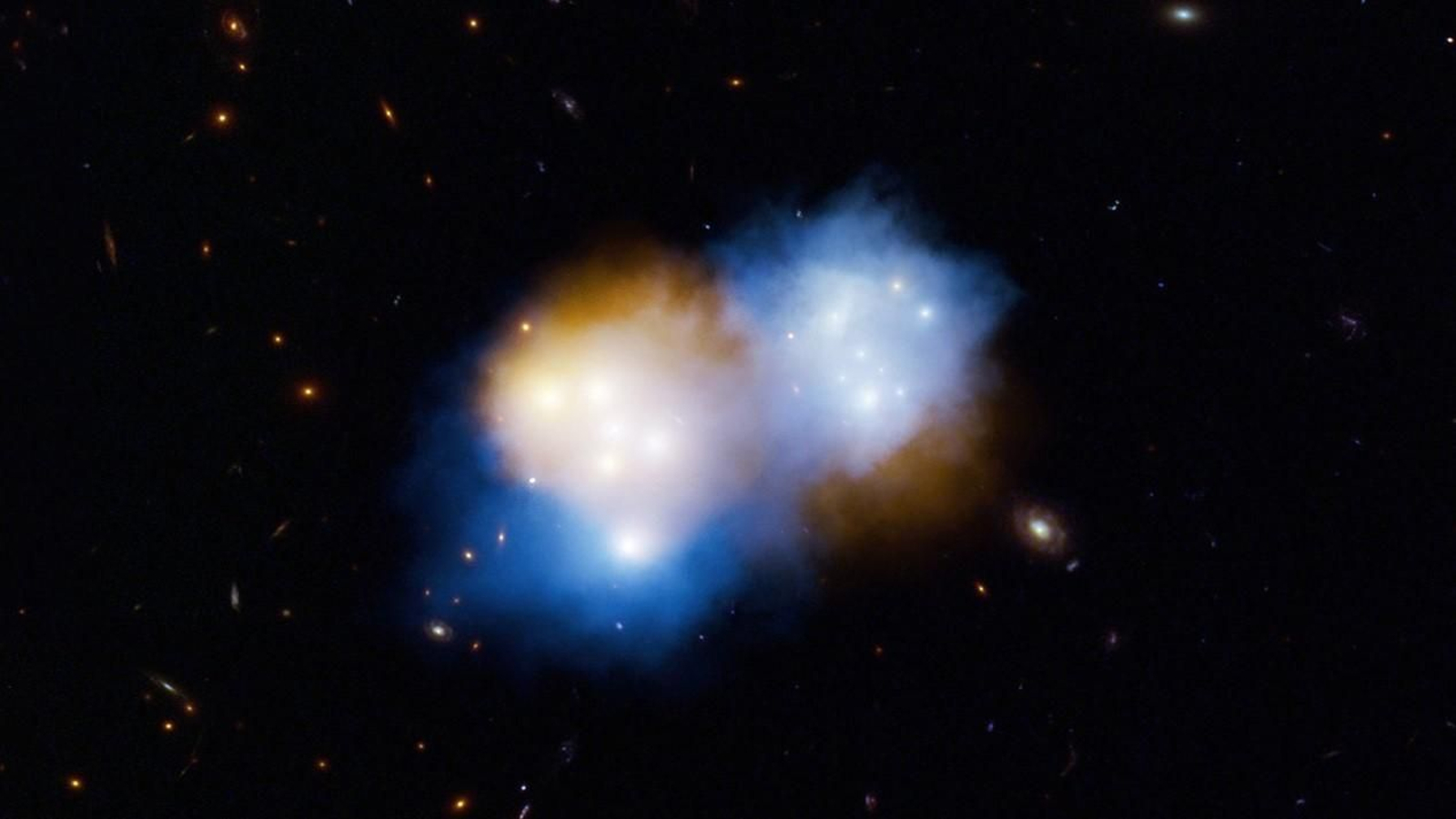 Ilustración artística de una colisión entre galaxias.