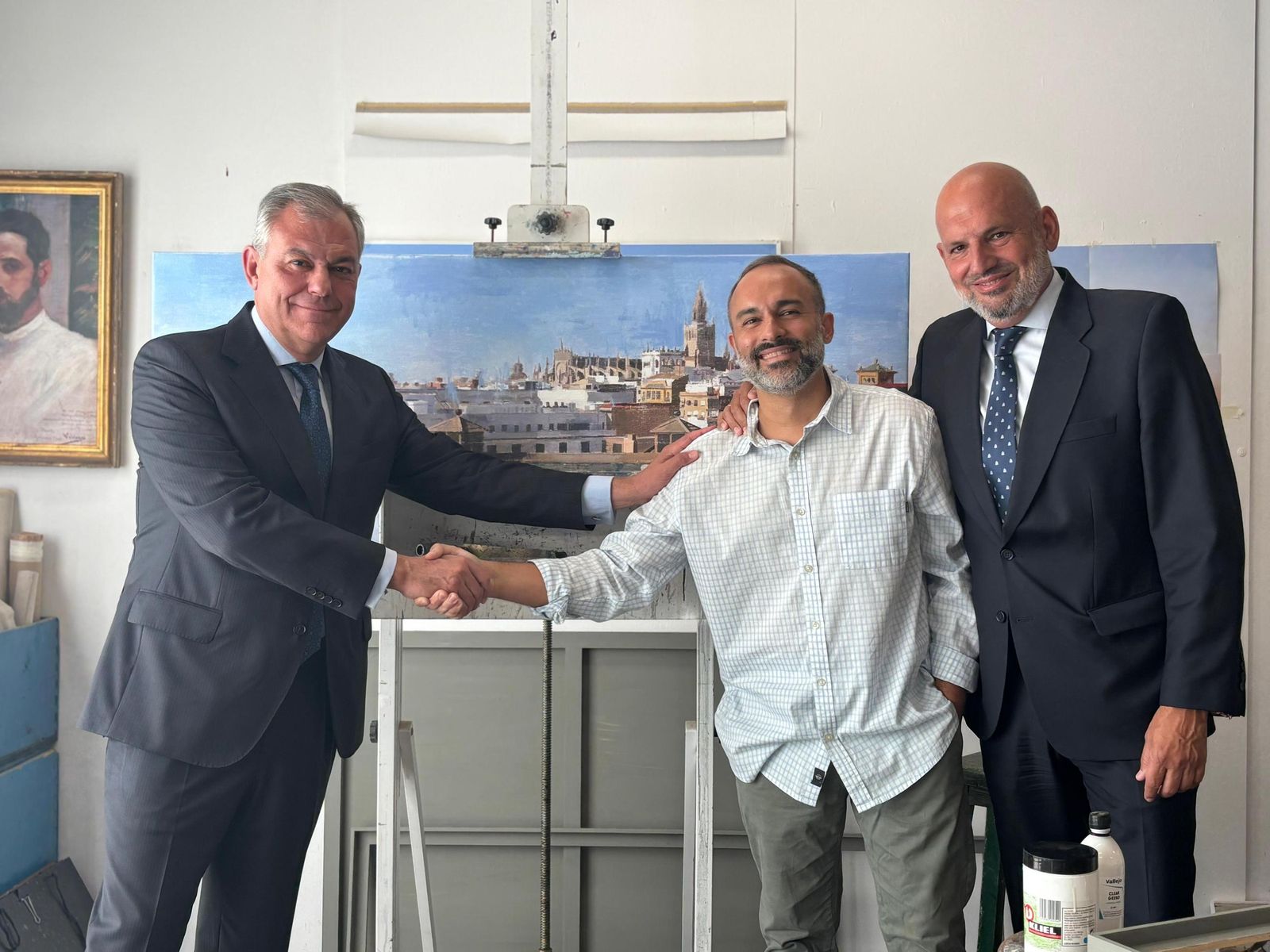 Sanz y Alés con el cartelista Daniel Franca.