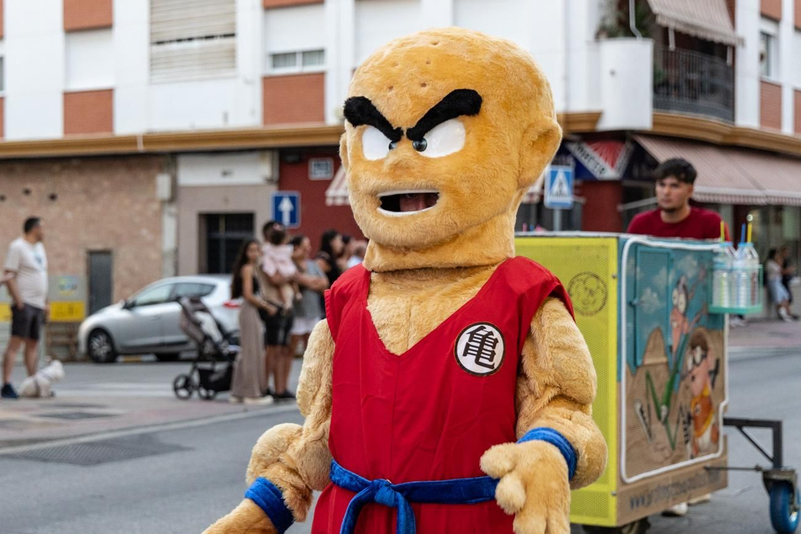 Pasacalles inaugural, fuegos artificiales e iluminación de la portada de feria y del recinto ferial de la Feria de San Bartolomé en Martos