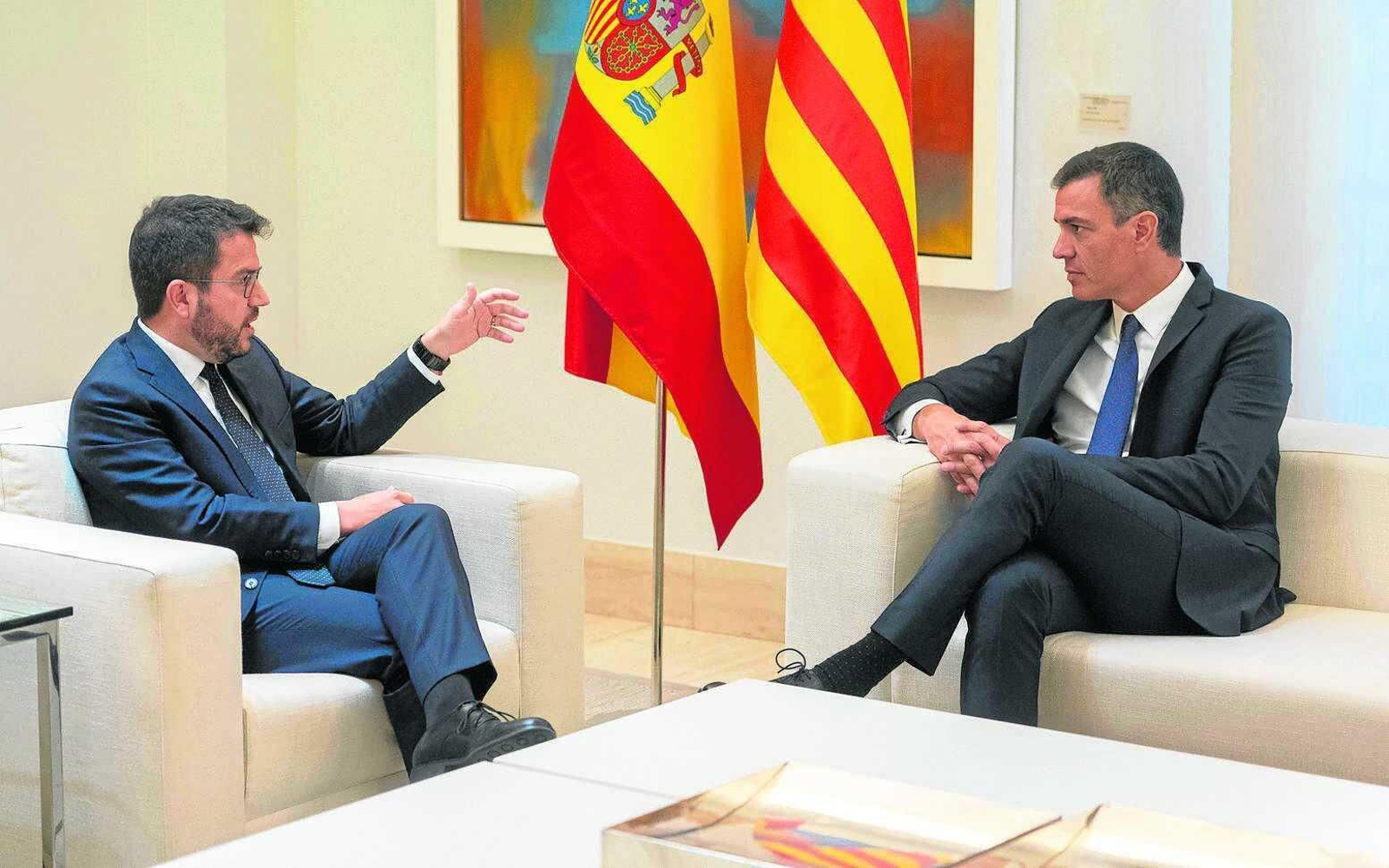 El presidente del Gobierno, Pedro Sánchez, y el presidente de la Generalitat, Pere Aragonès.