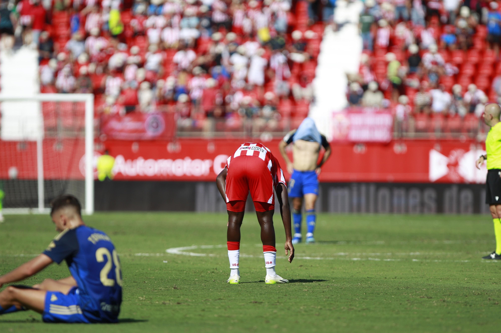 Imágenes del empate a 3 de la U.D. Almería y el Granada C.F.