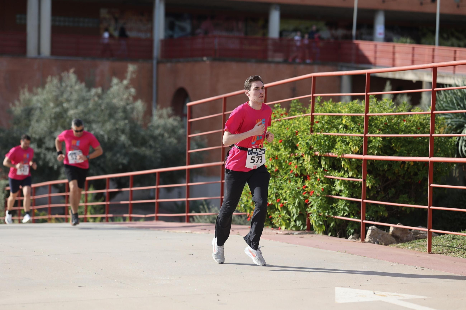 La carrera solidaria We Run de la UMA, en fotos