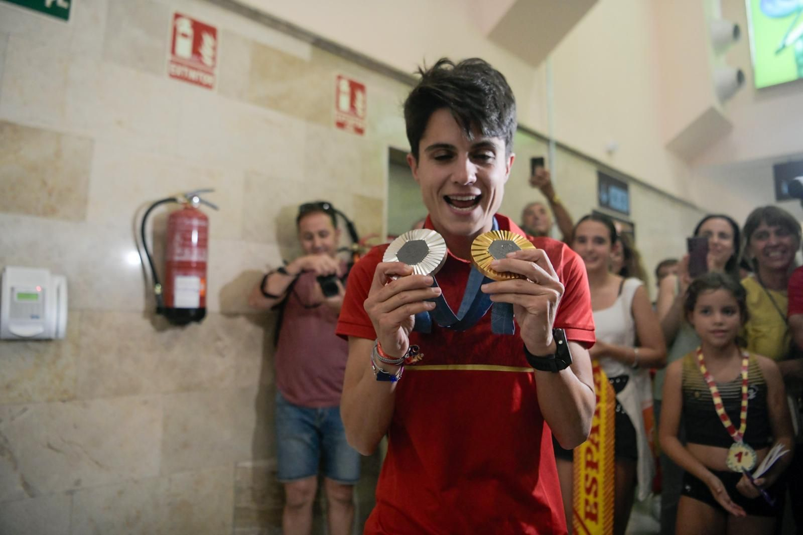 Granada recibe a la campeona María Pérez, en imágenes