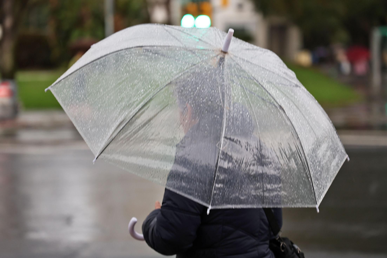 Las imágenes de la lluviosa mañana del jueves 13 de marzo en Huelva