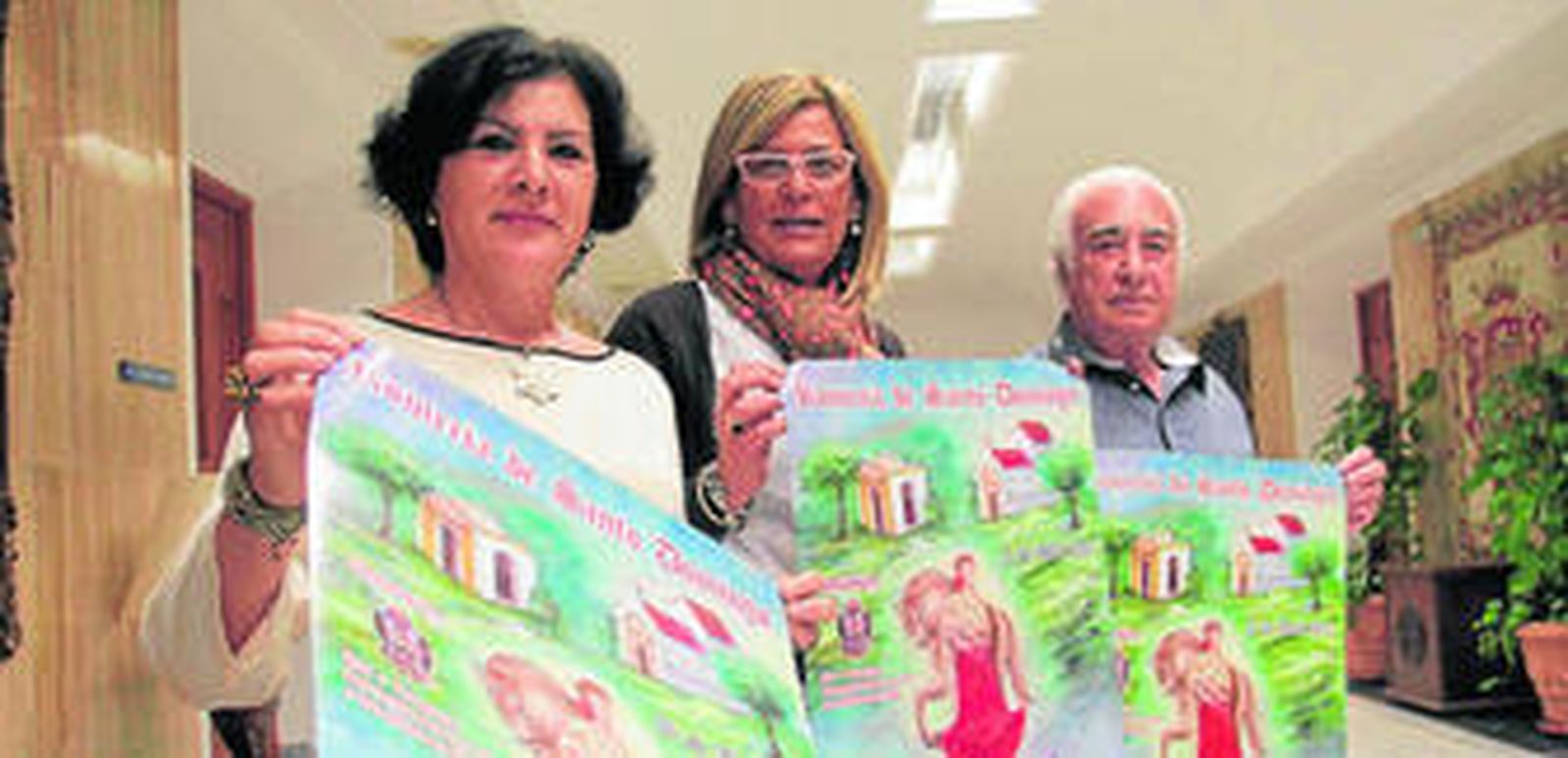 Caracuel, en el centro, con Pozuelo y Castillero, ayer, en la presentación de Santo Domingo.