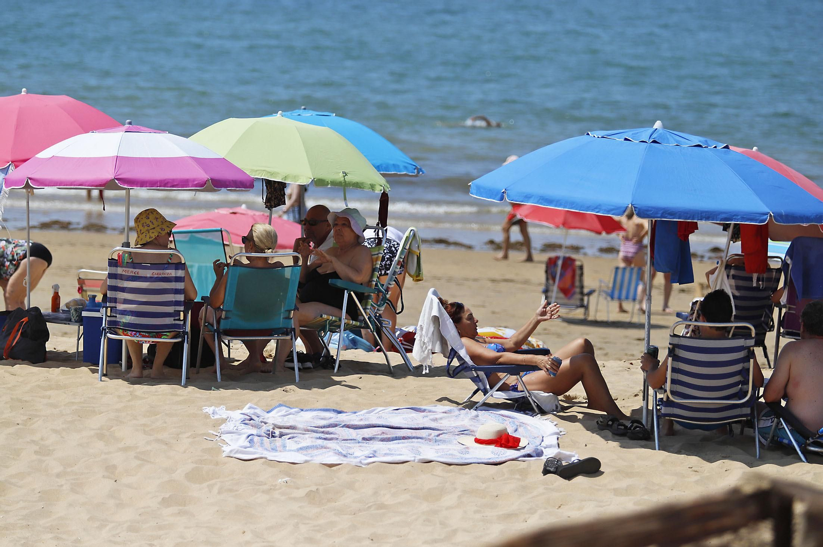 Las imágenes de la jornada de domingo en las playas de Huelva