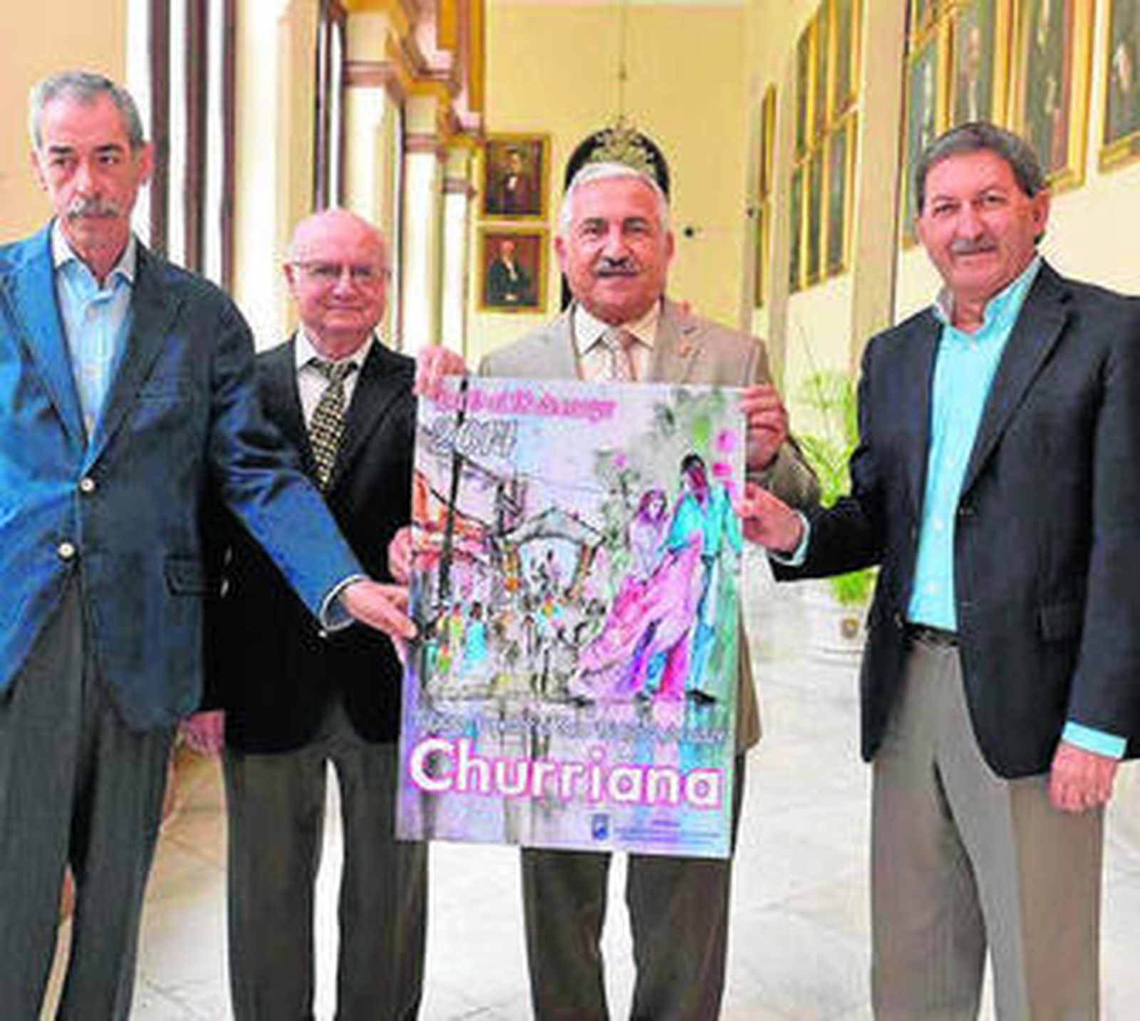 Presentación del cartel de la feria de Churriana, ayer en el Ayuntamiento.