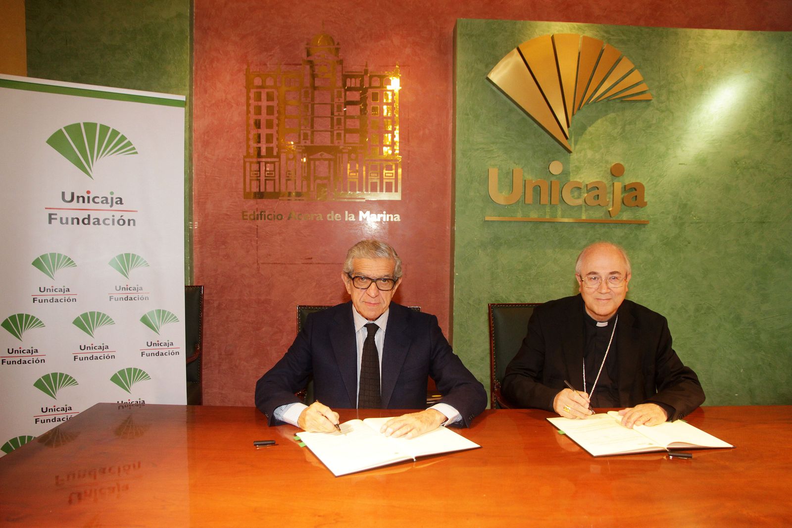 Braulio Medel, presidente de la Fundación Unicaja, y el obispo de Almería.